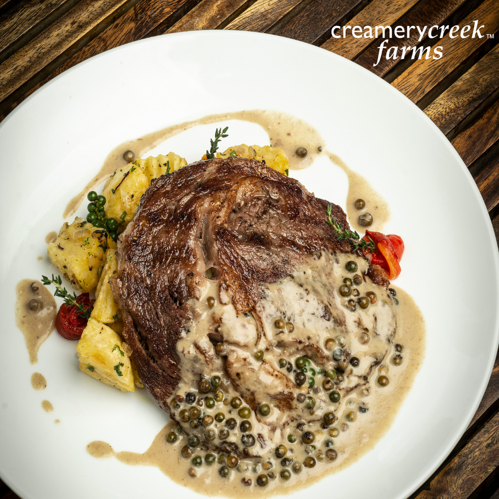 Ribeye Steaks with Creamy Peppercorn Sauce