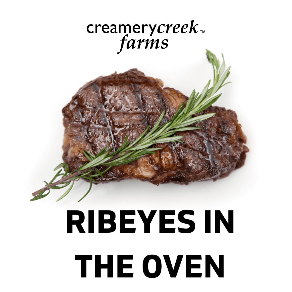 oven baked ribeye with a sprig of rosemary laid crossways
