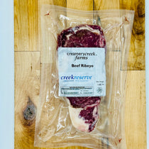 CreekReserve boneless ribeye steak on a cutting board