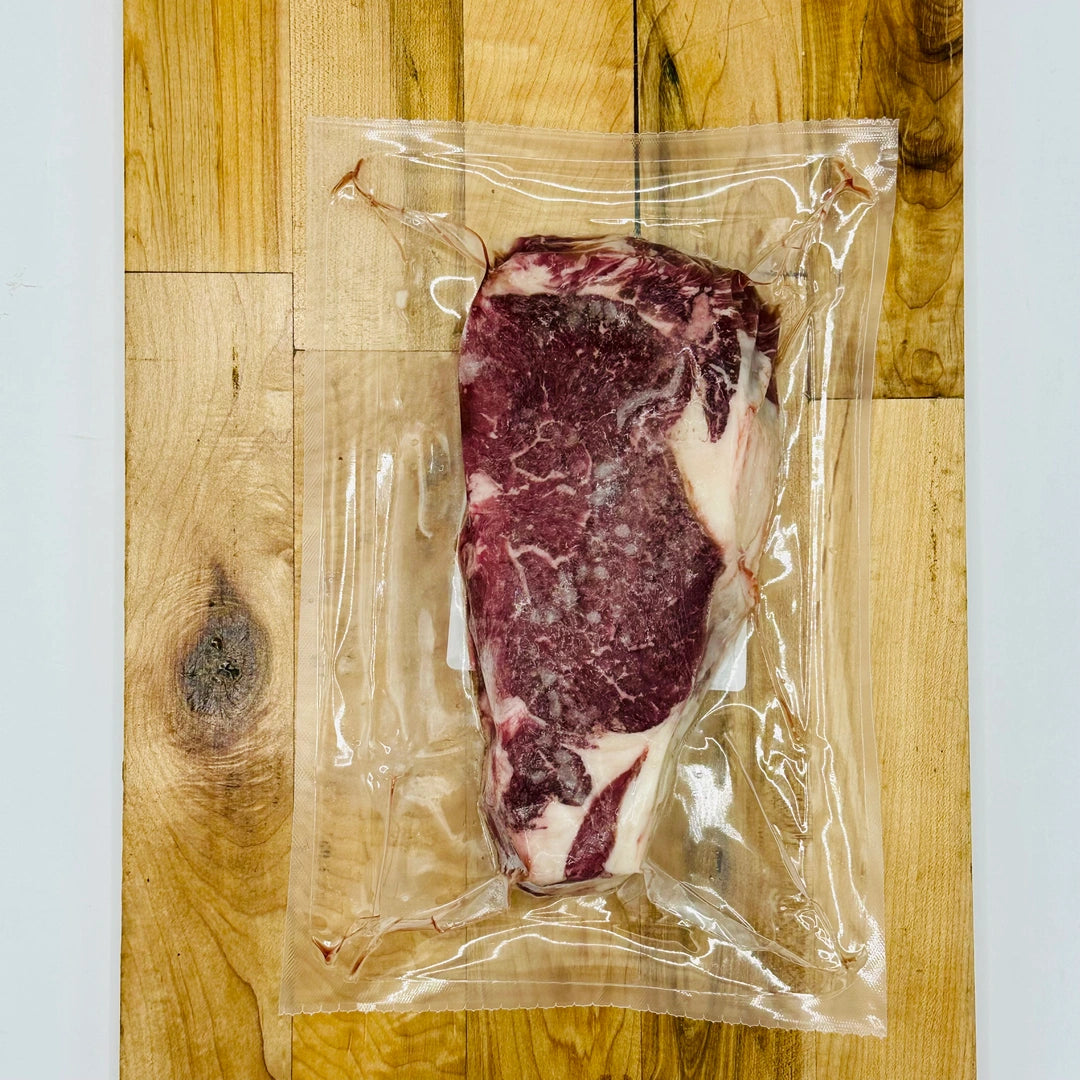 CreekReserve boneless ribeye steak on a cutting board