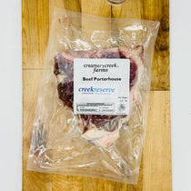 CreekReserve porterhouse steak on a cutting board