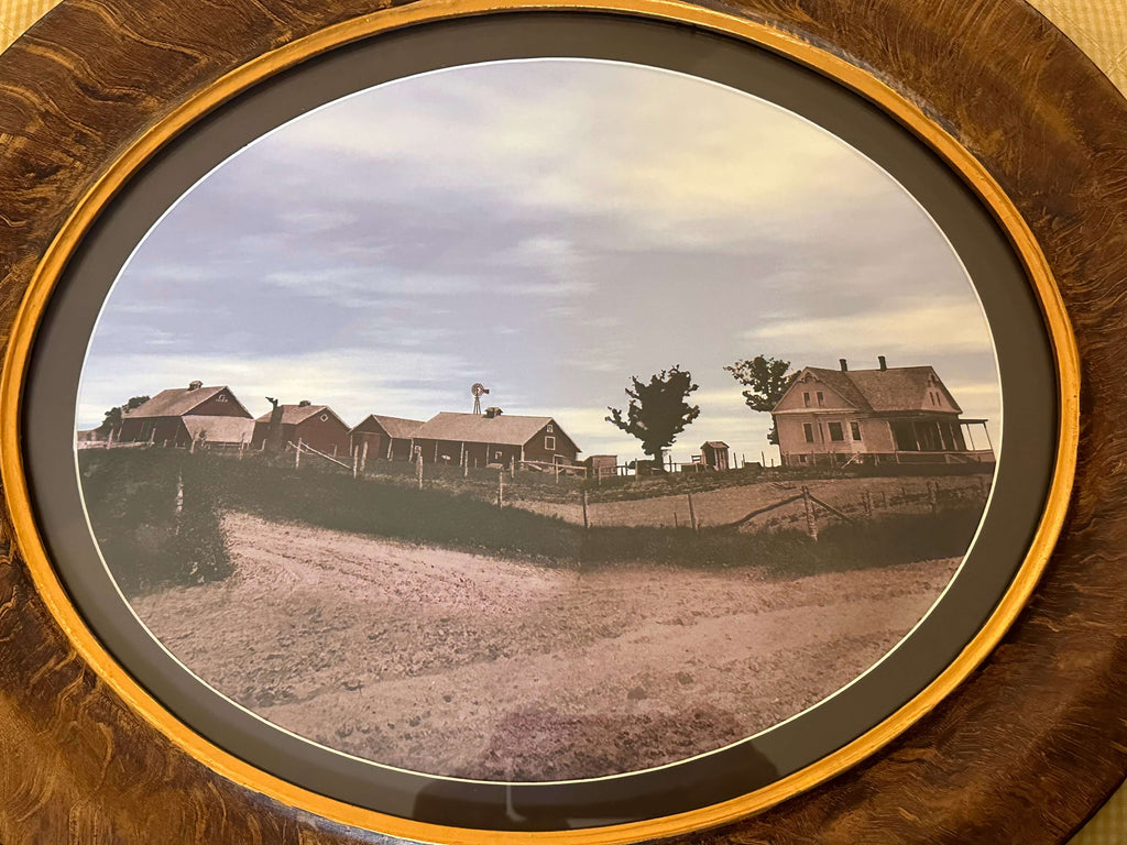 old farmhouse with farm buildings