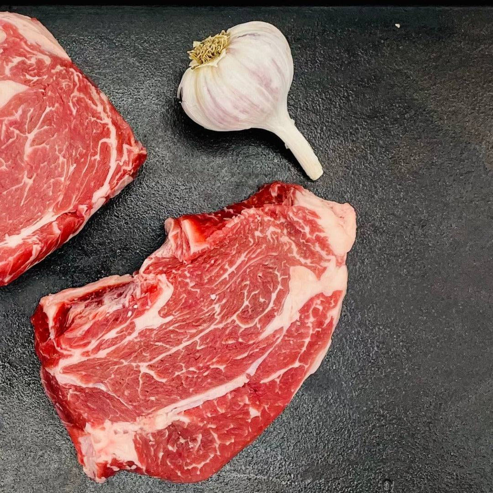 delmonico chuckeye and a bulb of garlic