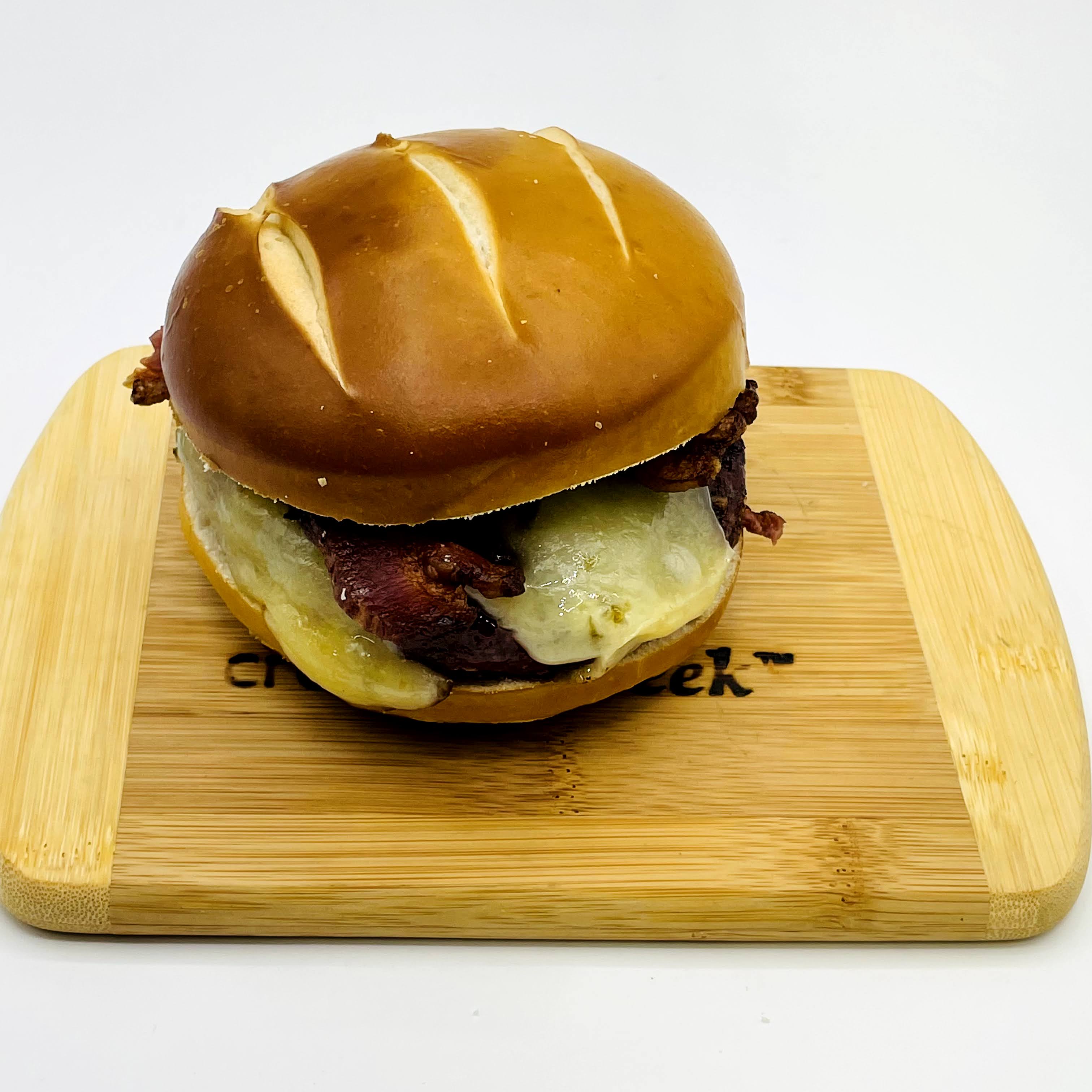 Creamery Creek German Burger on a Pretzel Bun