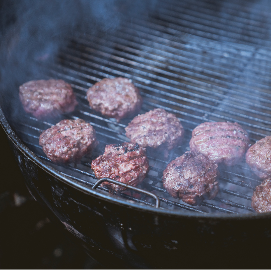 Grilling burgers on indirect heat on a kettle grill