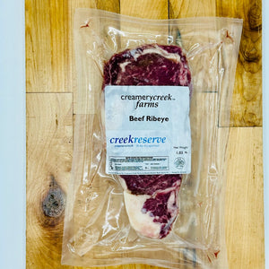 CreekReserve boneless ribeye steak on a cutting board