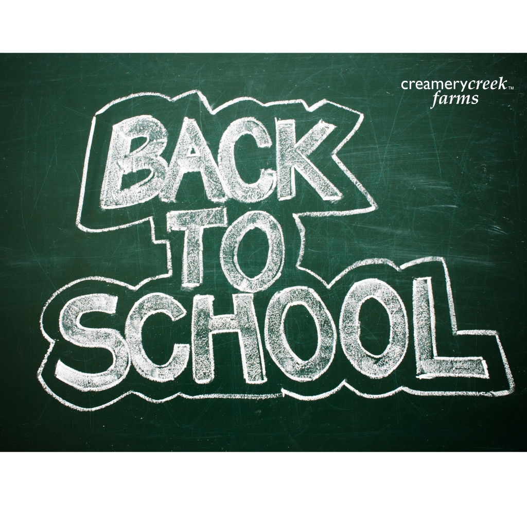 Chalkboard with 'Back to School' text and 'creamerycreek farms' branding.
