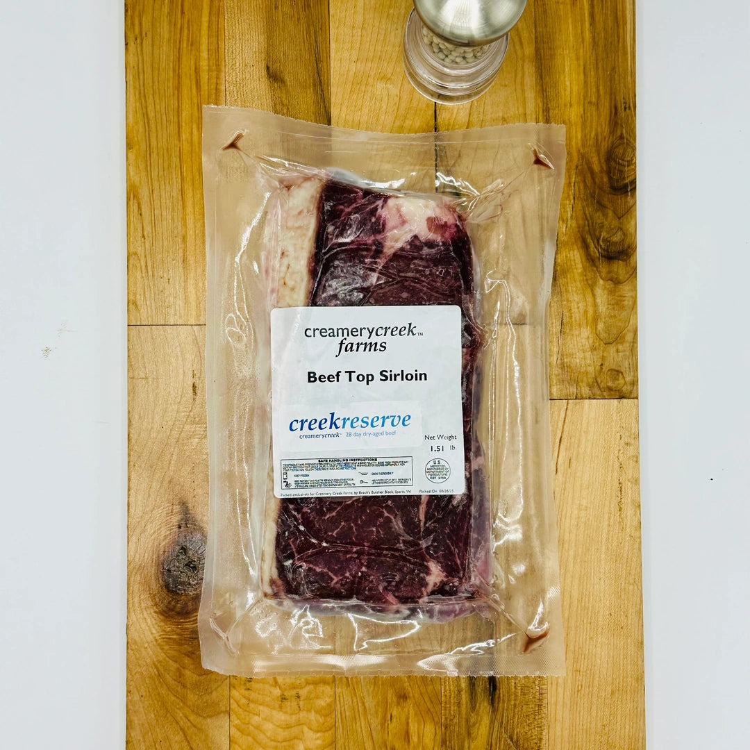 CreekReserve top sirloin steak on a cutting board