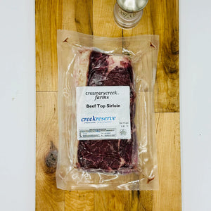 CreekReserve top sirloin steak on a cutting board