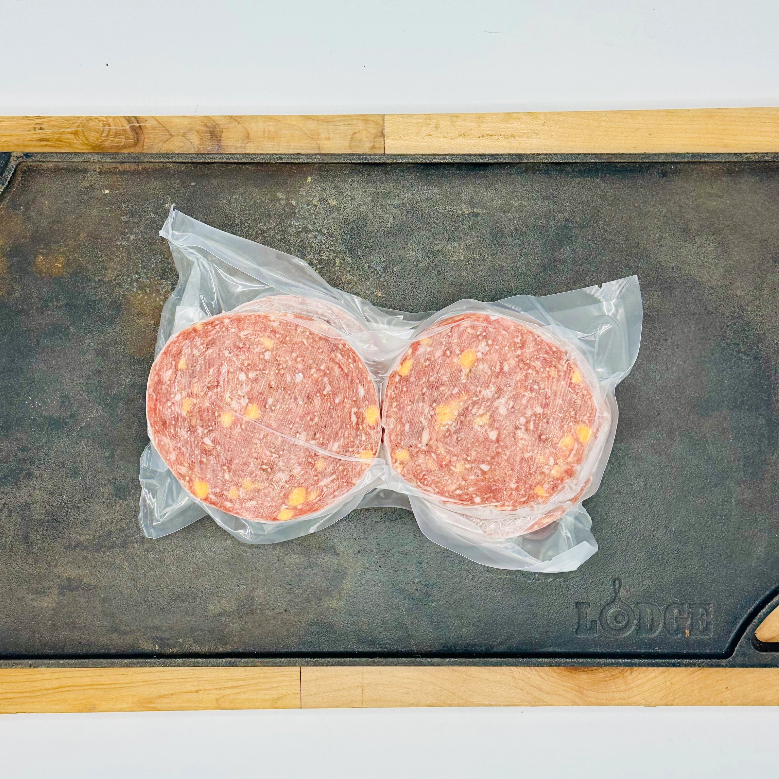 dry aged beef bacon cheeseburger patties back