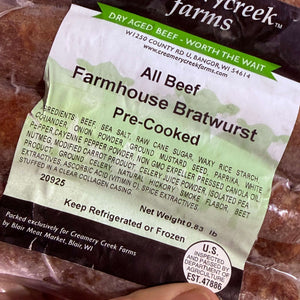 Package of Creamery Creek Farms All Beef Farmhouse Bratwurst with ingredients list.
